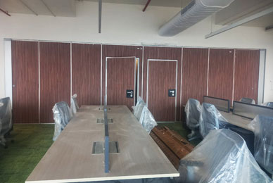 Acoustic wall panels installed in auditorium for echo control and sound management