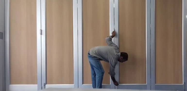 Acoustic sliding folding partition system for offices, hotels and commercial spaces in India